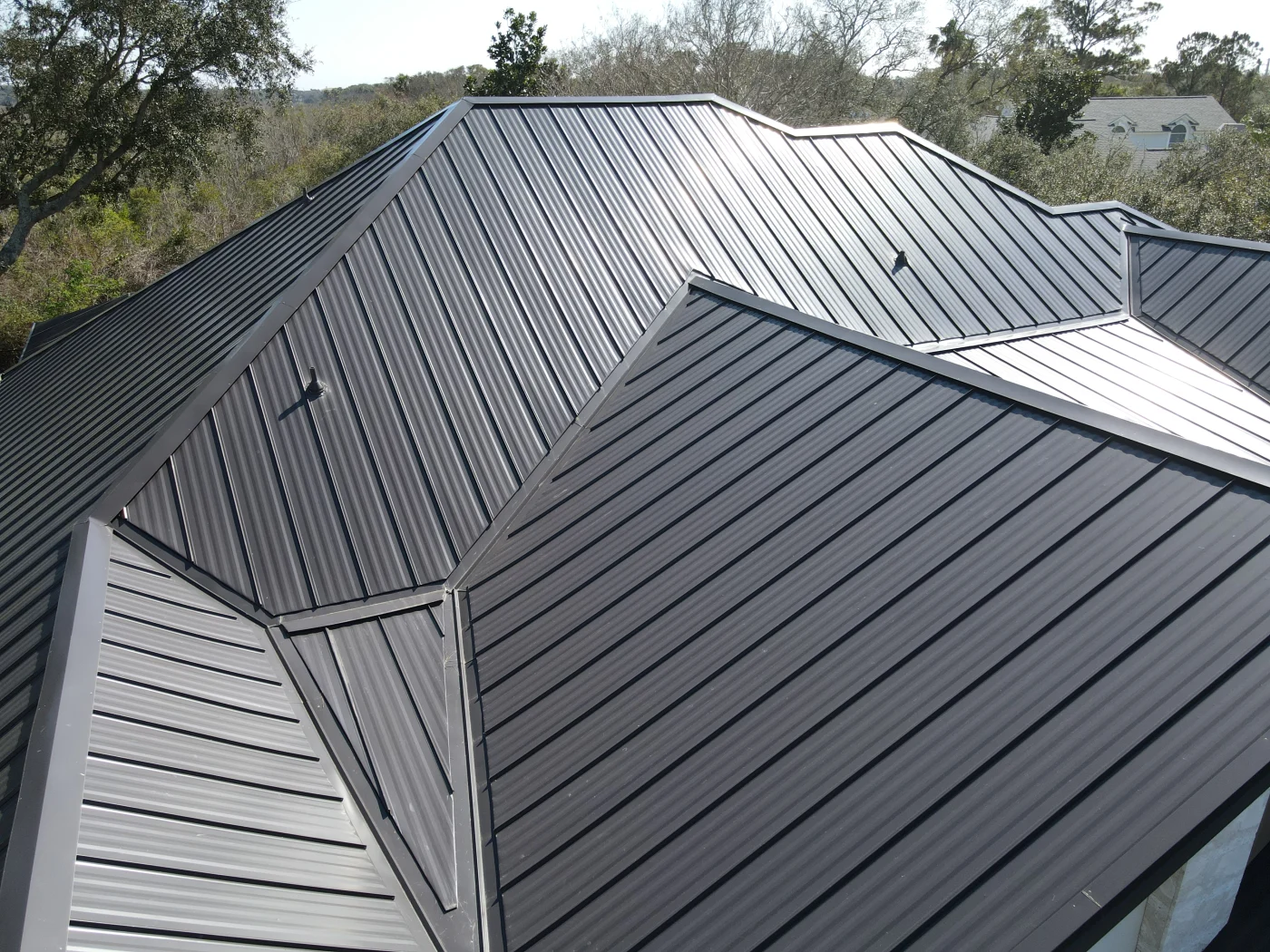 Roofing contractor installing shingles